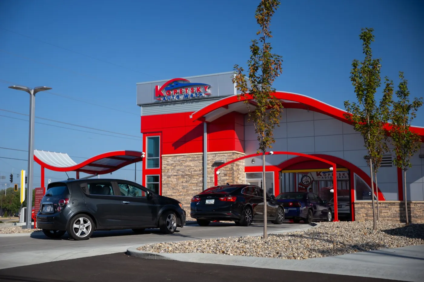 Cars lined up at a Kopetsky Auto Wash location